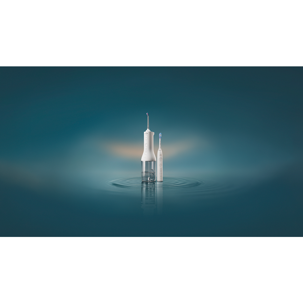Philips Sonicare Cordless Power Flosser 3000 + Akumulatorska zobna ščetka Sonicare 7100 HX3887/41